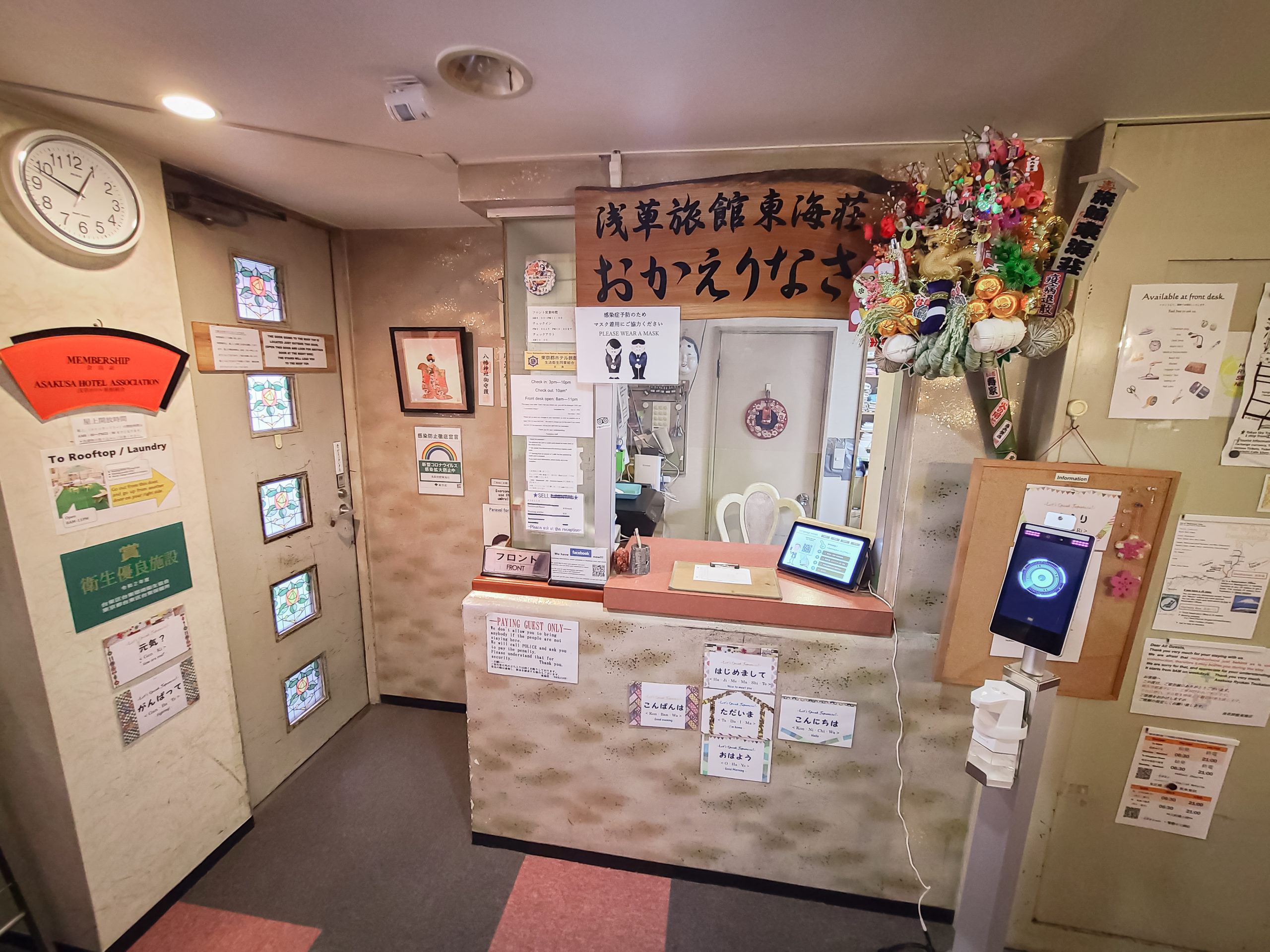 The front lobby with a sign, “Welcome Back” in Japanese