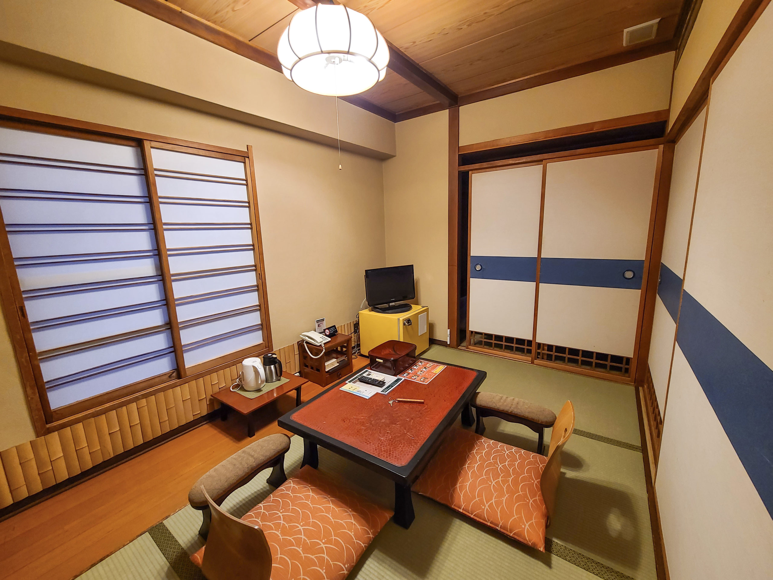 My room, with two sliding panels leading to the sleeping area