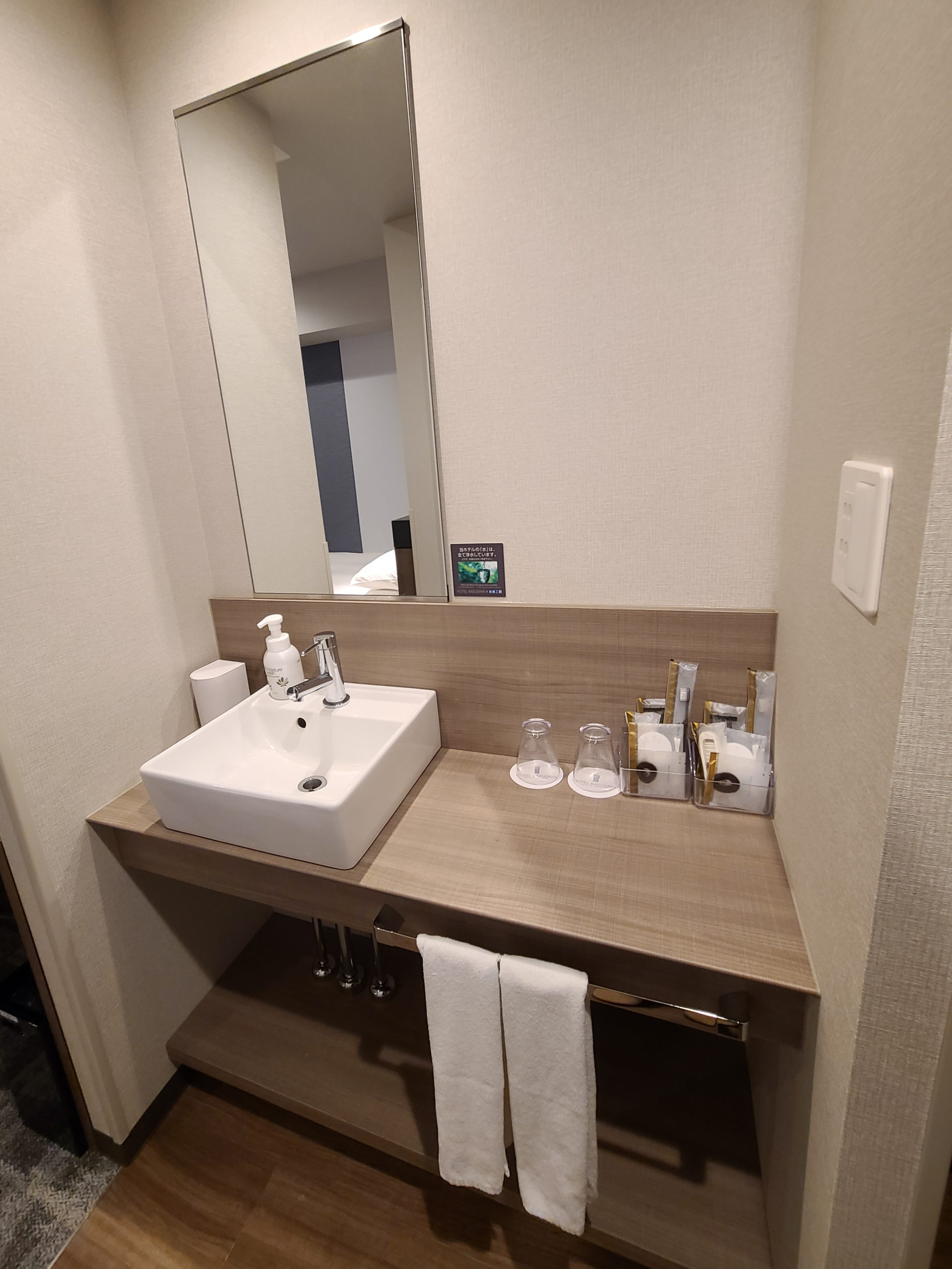 This room has a separate shower, toilet, and sink