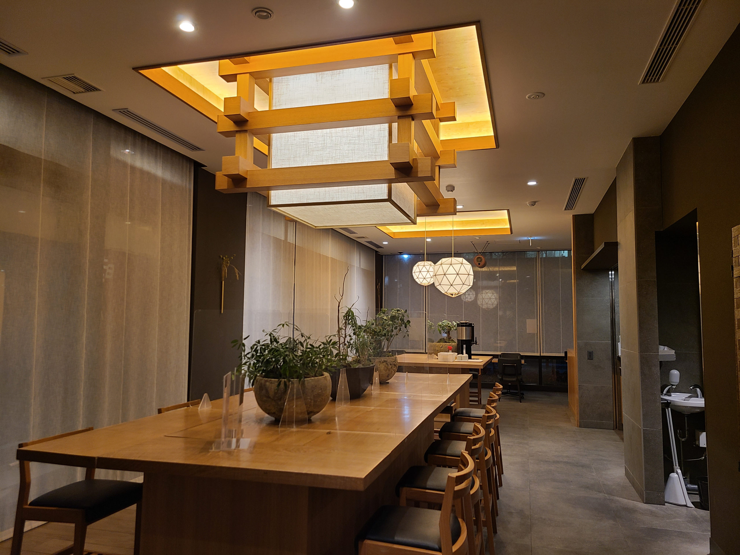 The restaurant displays traditional inspiration in its lighting fixtures