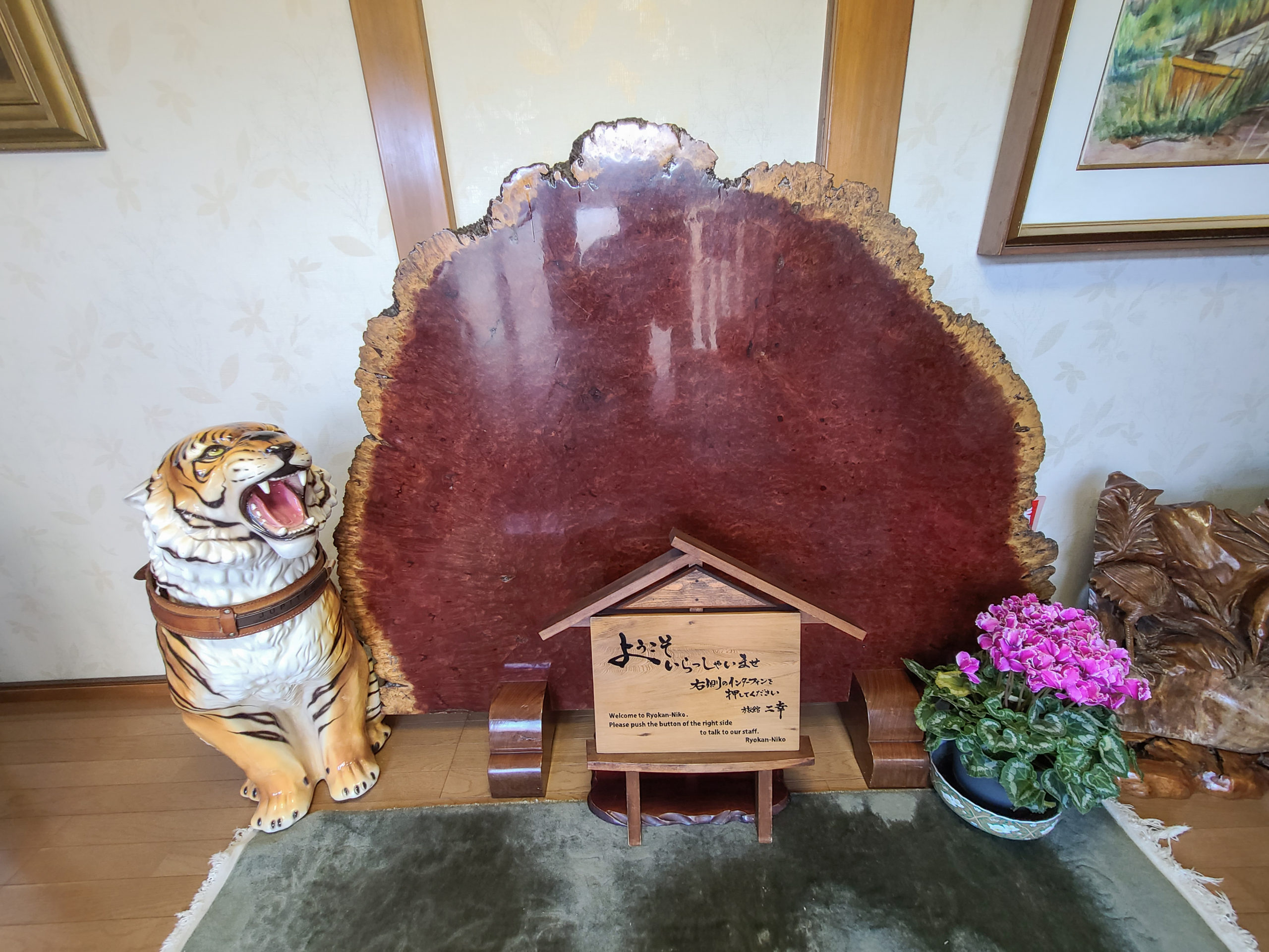 A porcelain tiger named “Jupiter” greets guests in the entryway