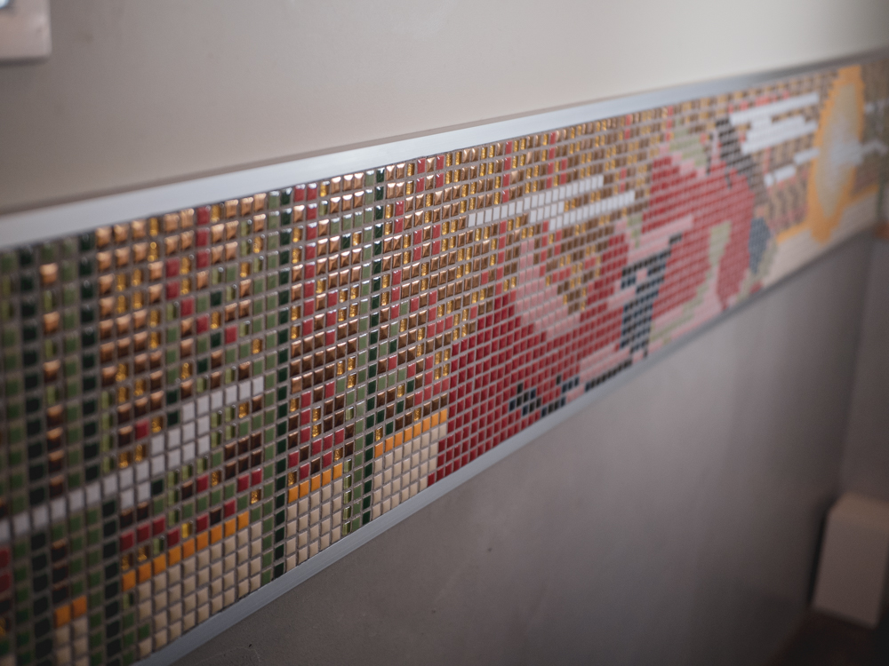 Ishii-san holding an English booklet explaining the story of Kintarou