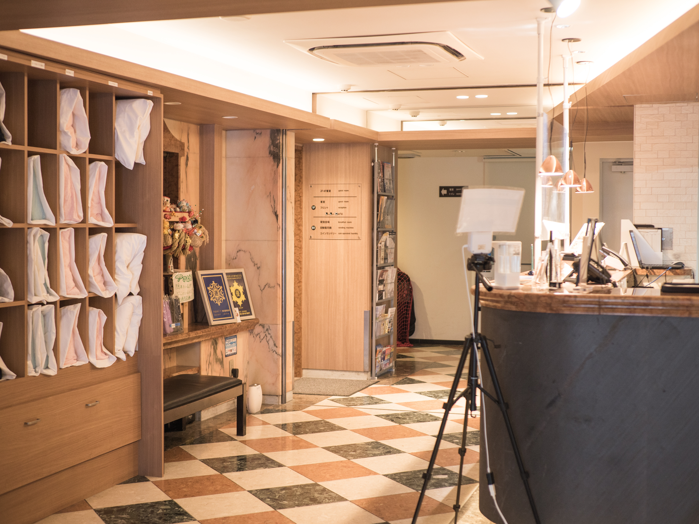 I arrive at my destination and climb up some steps to meet with Noritake-san, the owner of the hotel, in the hotel café next to the slightly fancy-looking lobby.