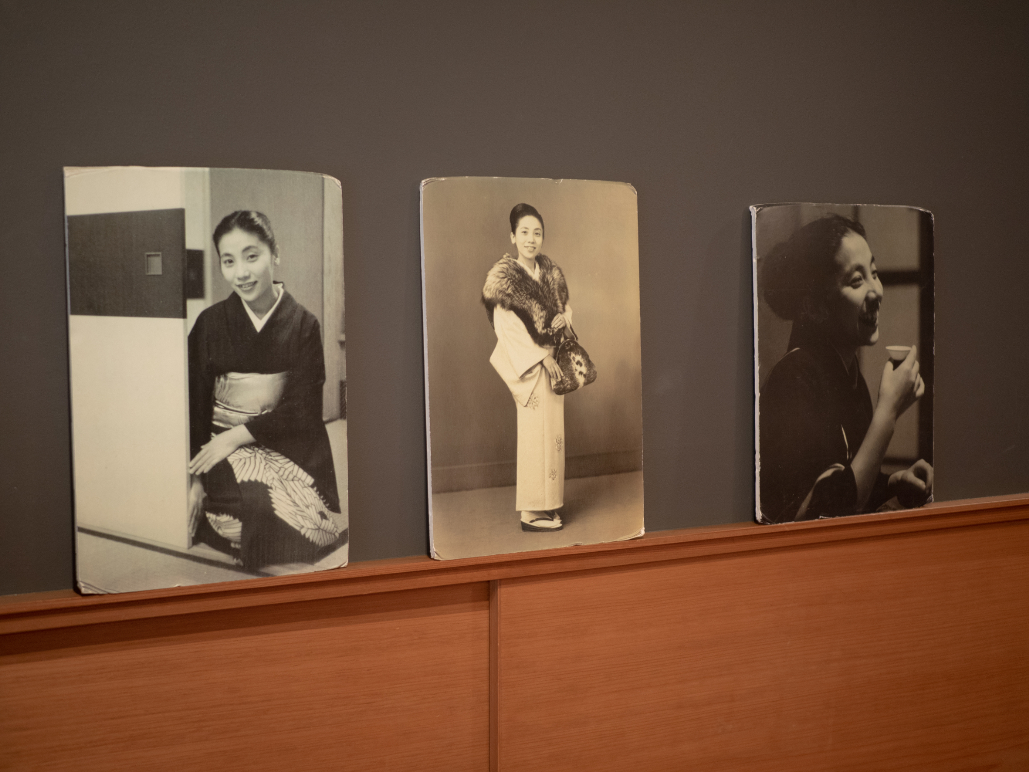 Old photos of Suzu displayed in the entrance of the ryokan