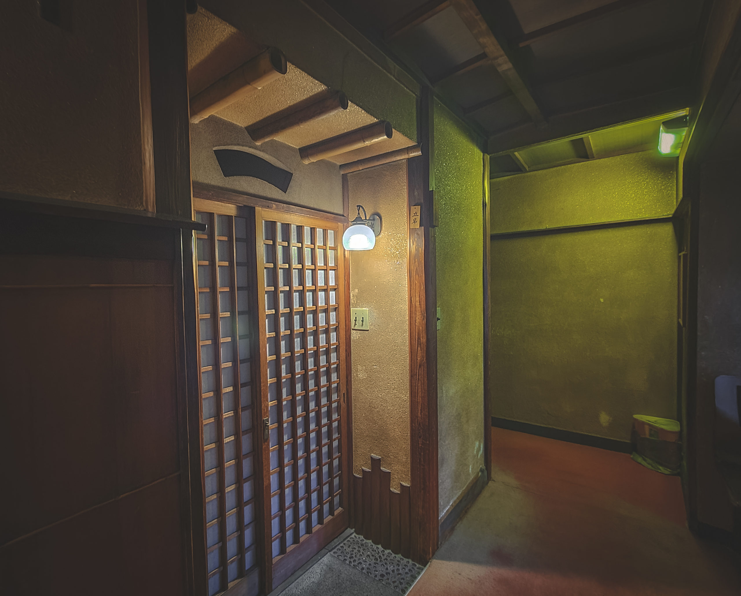 The entrance to one of the guest rooms—this architecture style is not usually found in ryokan 